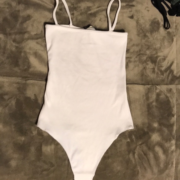 Brandy Melville Tops - Brand new brandy Melville one piece body suit